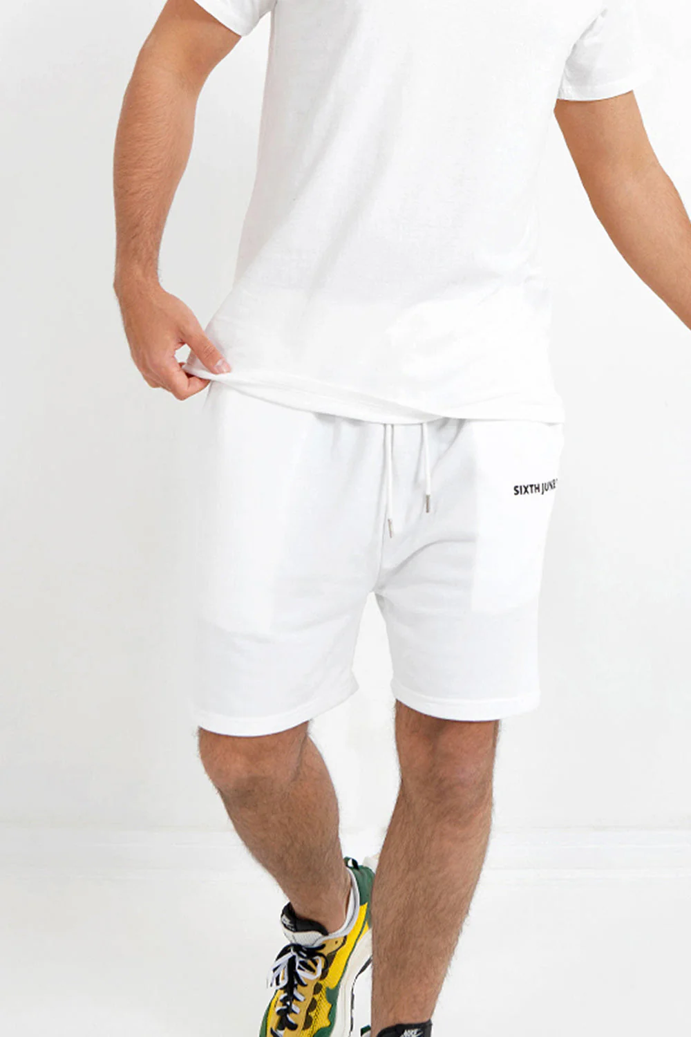 Short essential logo Blanc