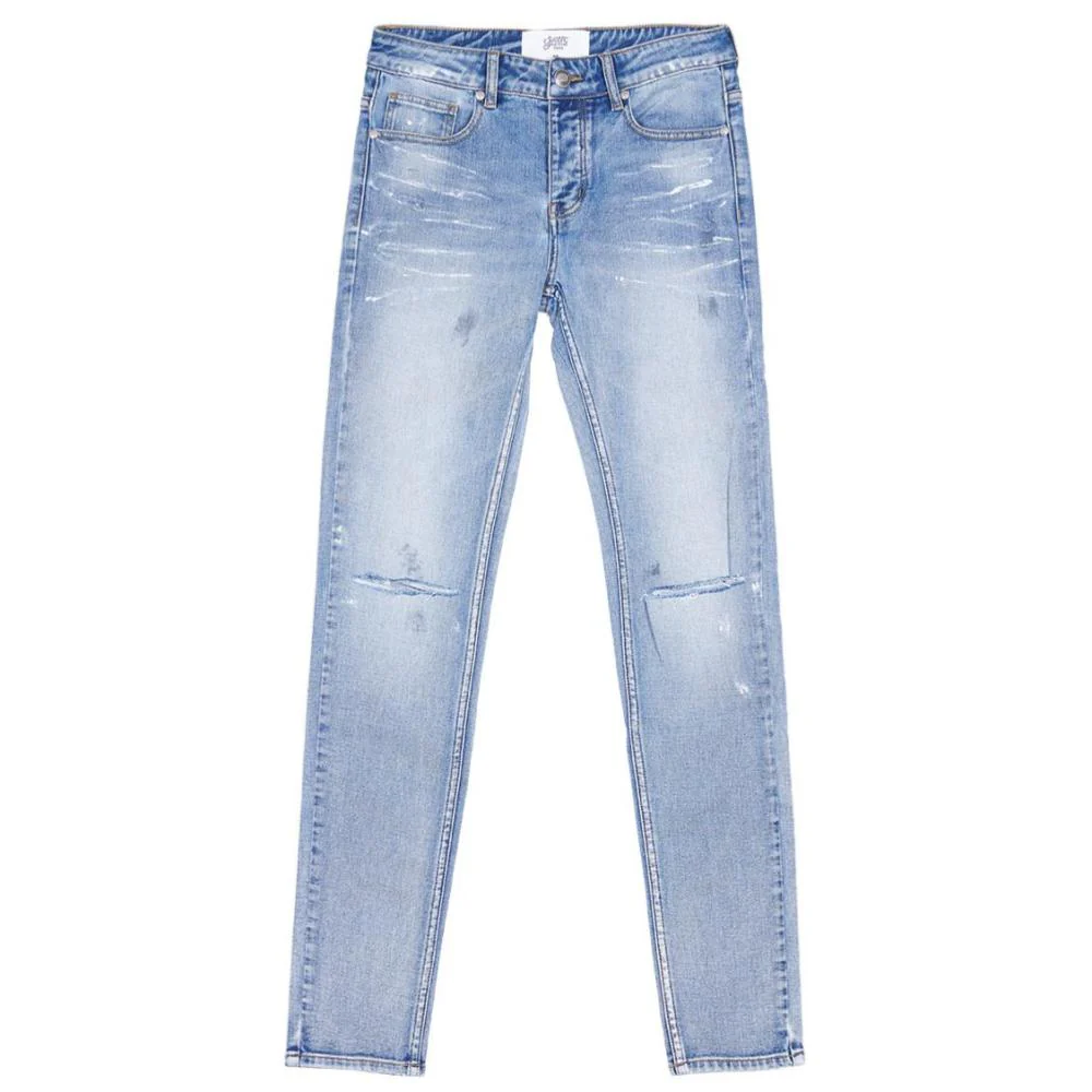 Jean déchiré tacheté skinny bleu