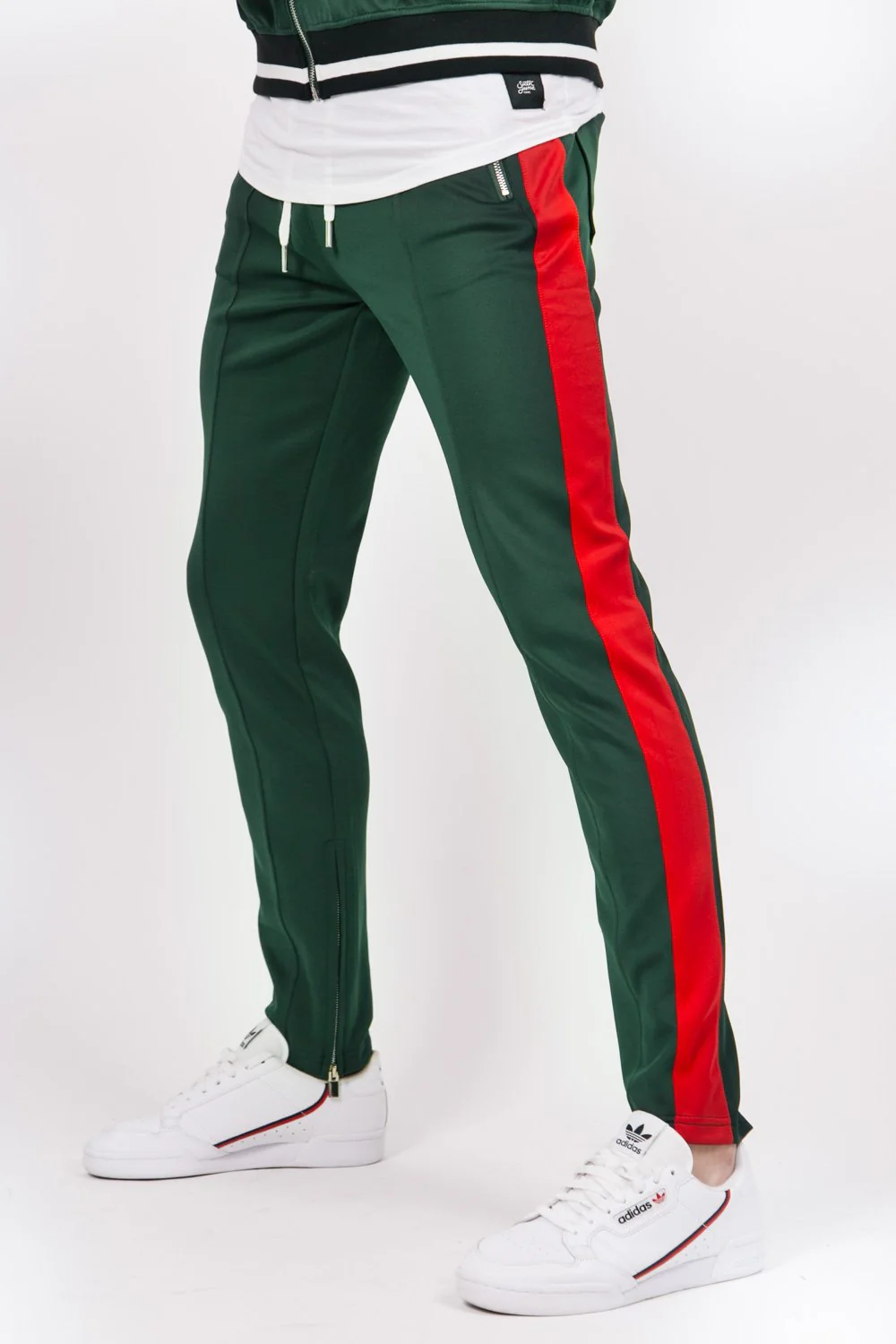 Jogging bicolores zips vert rouge
