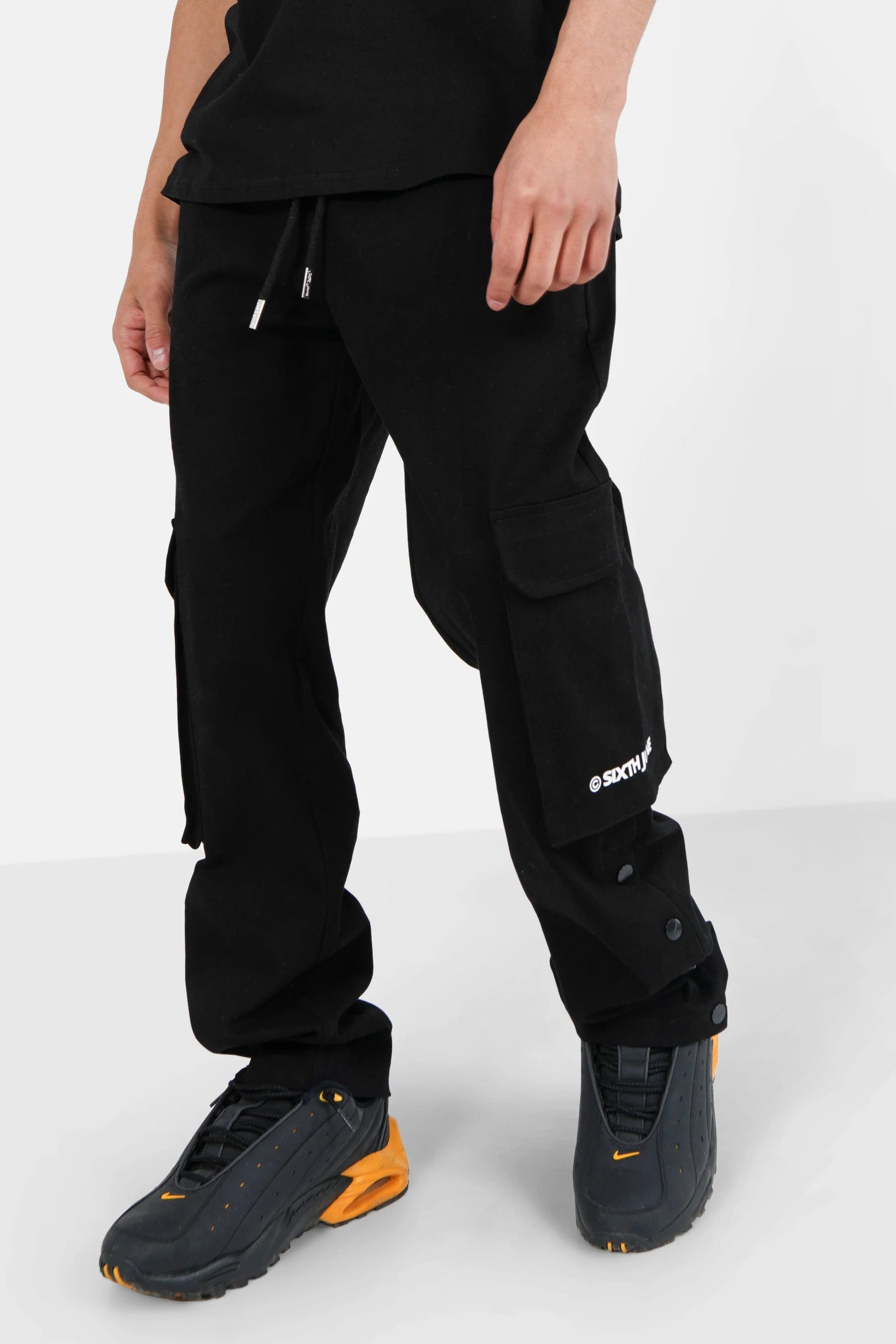 Pantalon cargo boutons chevilles Noir