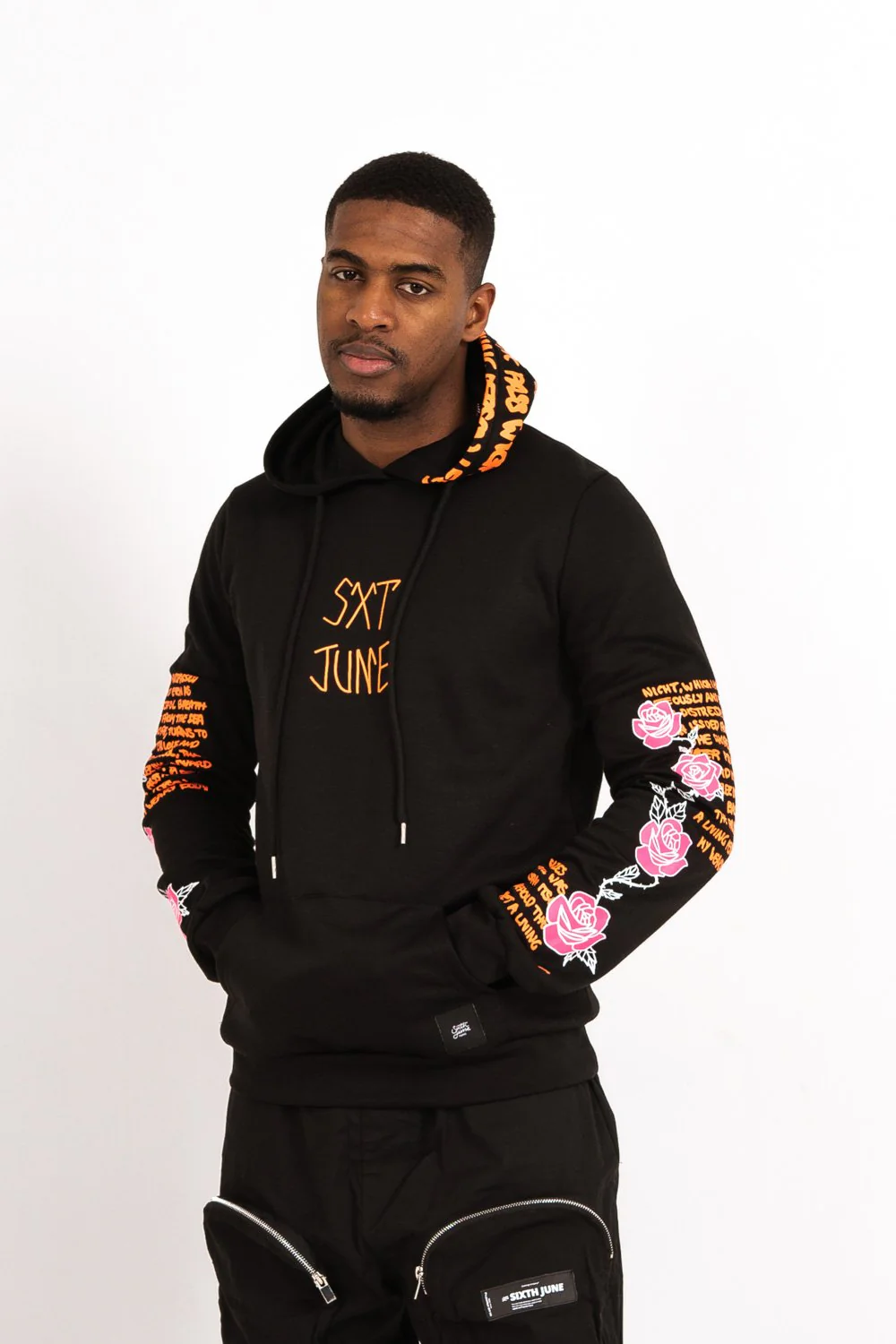 Sweat capuche imprimé tête de mort noir orange